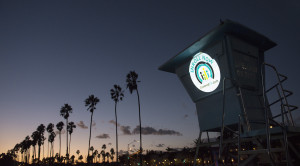 As part of Covered California&apos;s "Spotlight on Coverage" statewide bus tour to raise awareness on the open enrollment period, iconic landmarks and buildings across the state are being lit up with Covered California&apos;s logo and colors. Here is a lifeguard tower on the Central Coast on Wednesday Nov. 4, 2015. (PRNewsFoto/Covered California)
