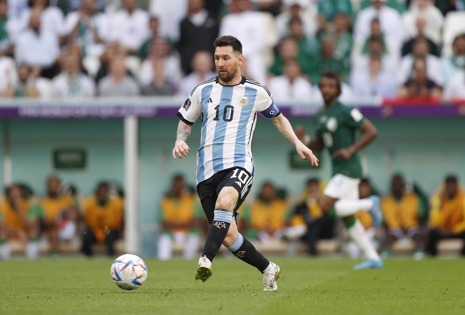 Lionel Messi plays the ball against Saudi Arabia during a group stage match during the 2022 World Cup at Lusail Stadium. Mandatory Credit Yukihito Taguchi-USA TODAY Sports