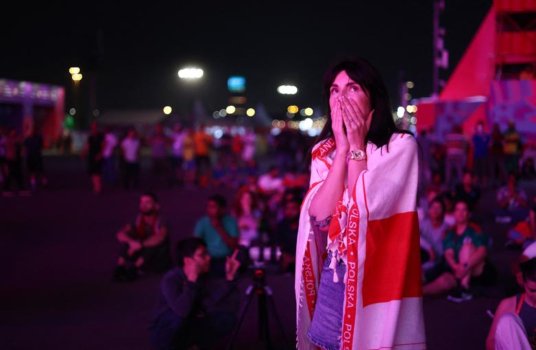 A Poland fan reacts during their match against Mexico. REUTERS/Pedro Nunes