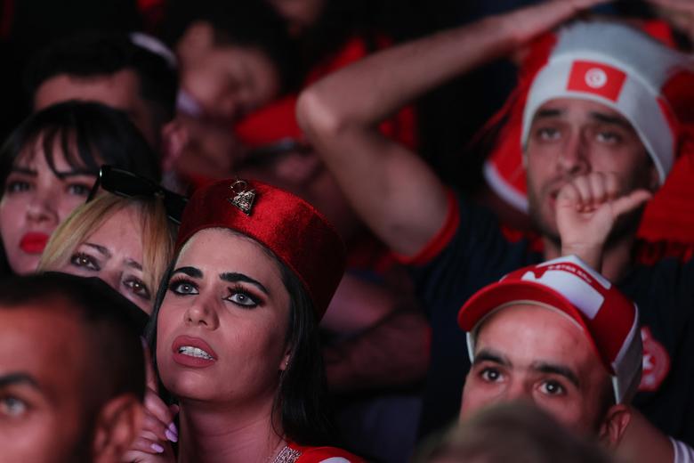 Tunisia fans watch their match against Denmark. REUTERS/Amr Abdallah Dalsh